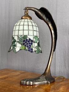 Tiffany style lamp with eagle at the apex